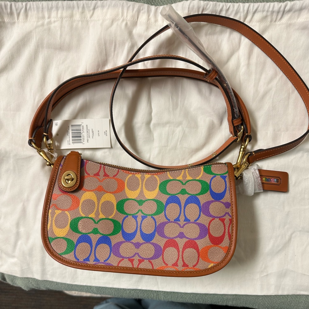 NWT COACH PRIDE SWINGER! 1941 collection